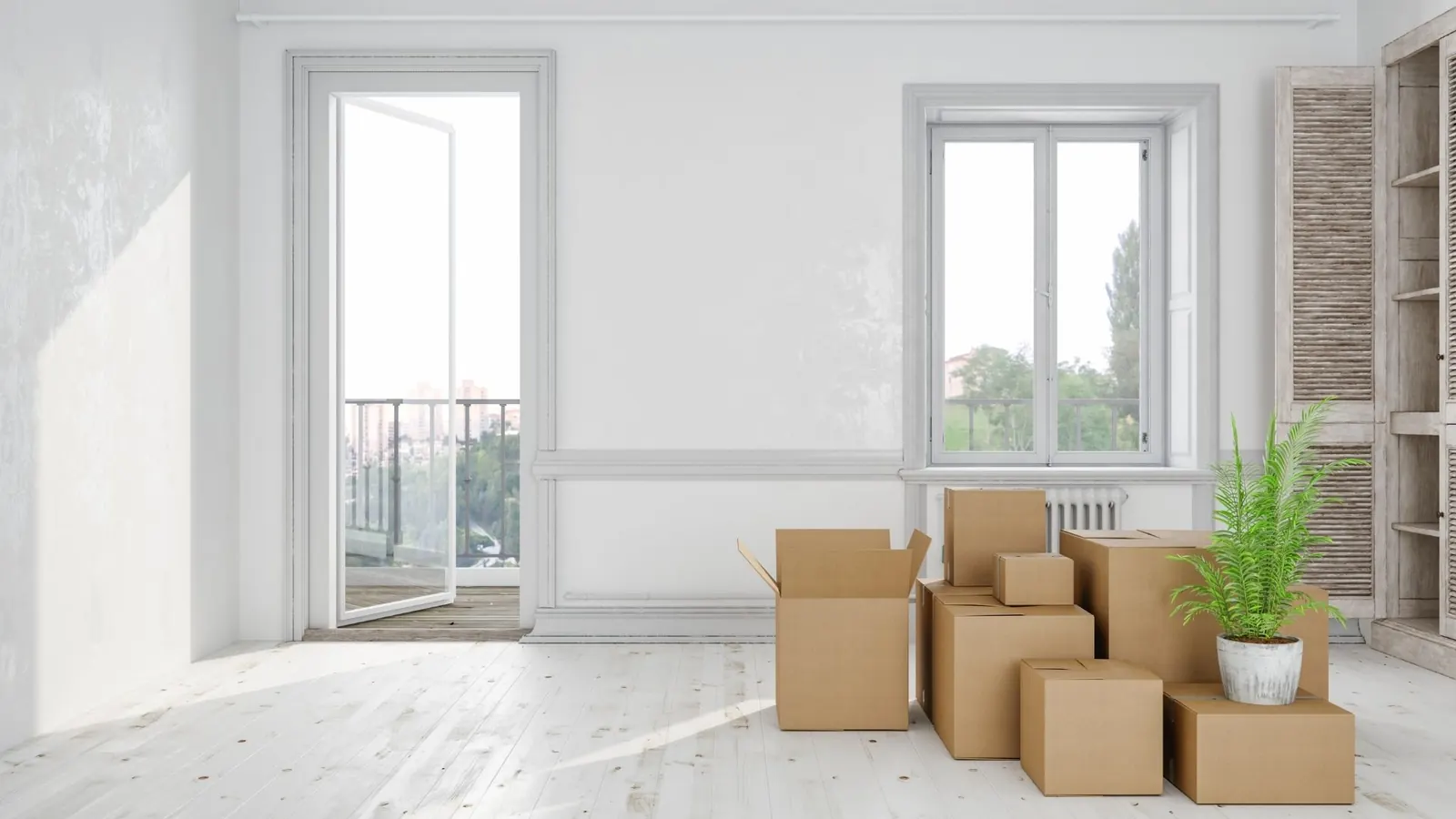 Bright apartment room with boxes after move-in cleaning service